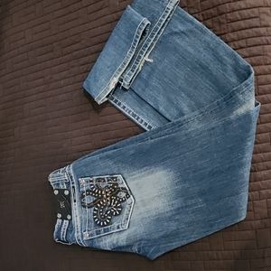 Miss Me fleur-de-lis jeans.